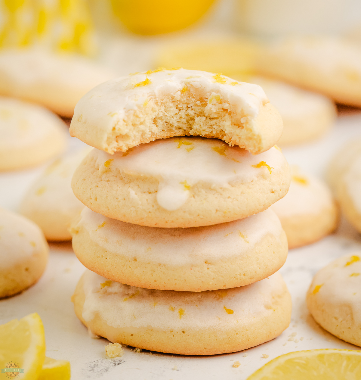 stack of buttermilk lemon cookies with a bite taken out