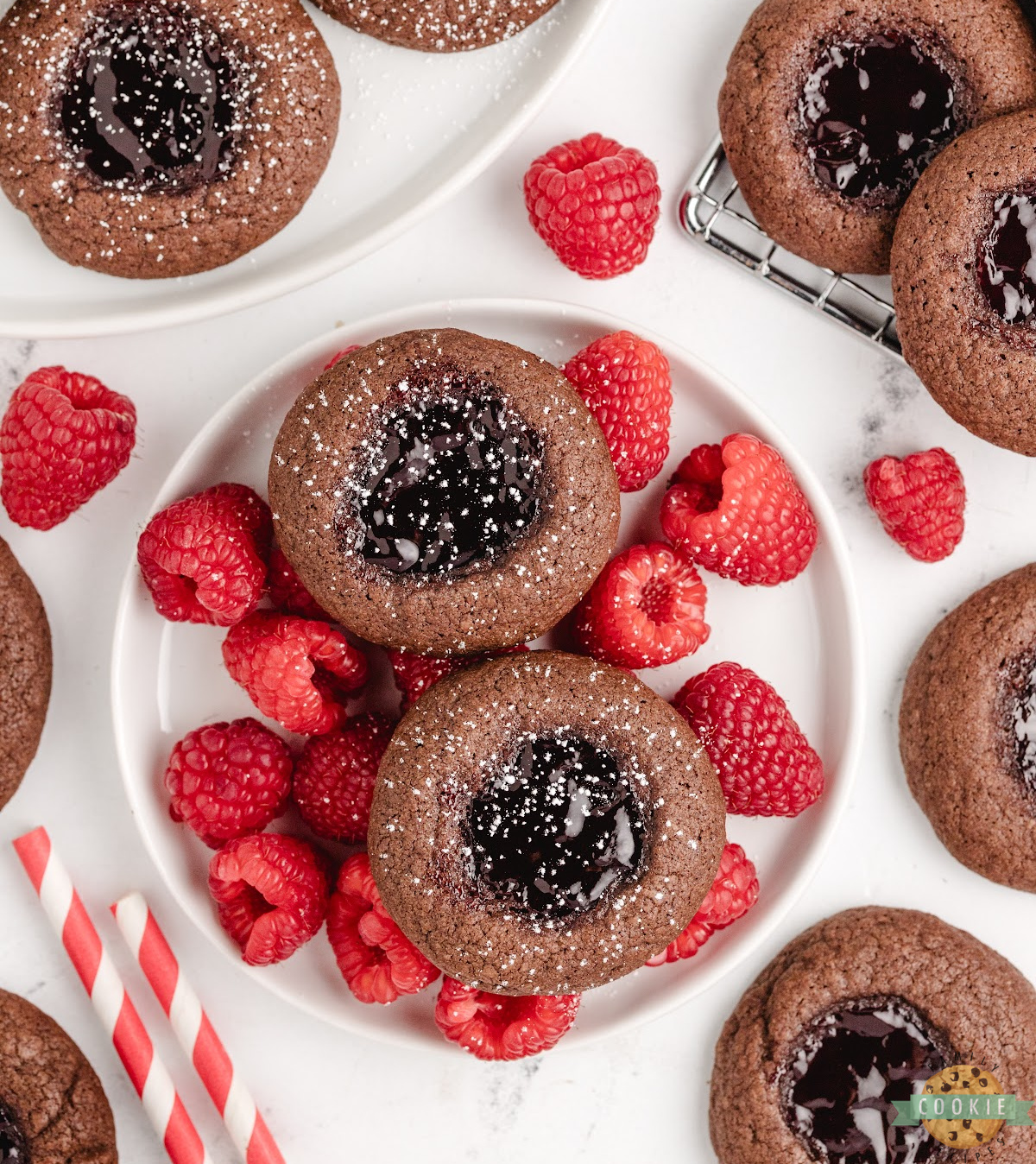 Chocolate thumbprint cookies with raspberry jam in the middle.