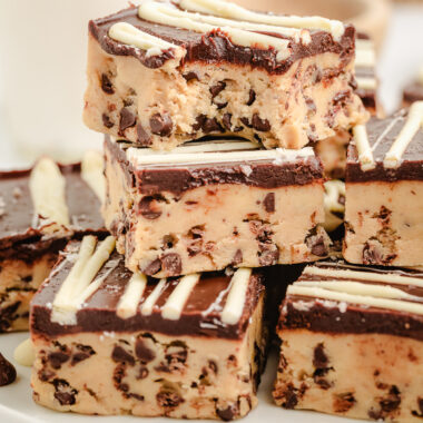 cookie dough bars with a bite taken out of one