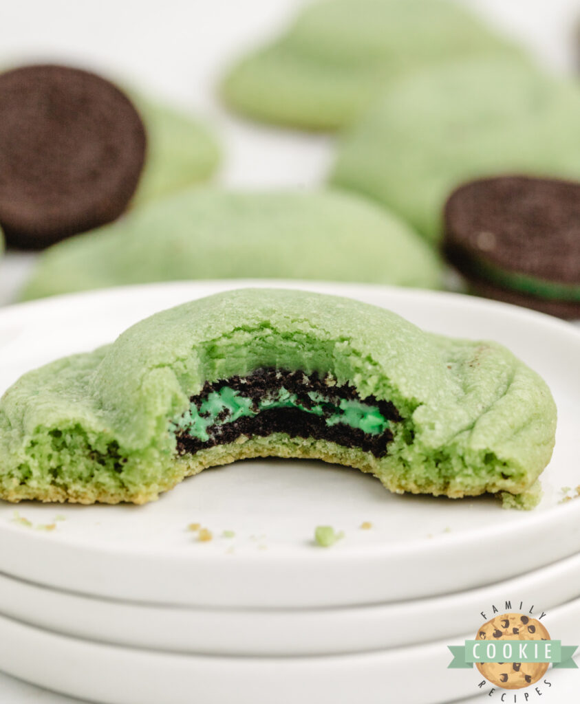 Mint Oreo Stuffed Cookies broken open to show the Oreo center.