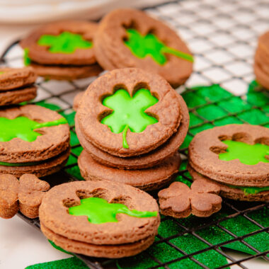 Shamrock Linzer cookies on a cooling rack