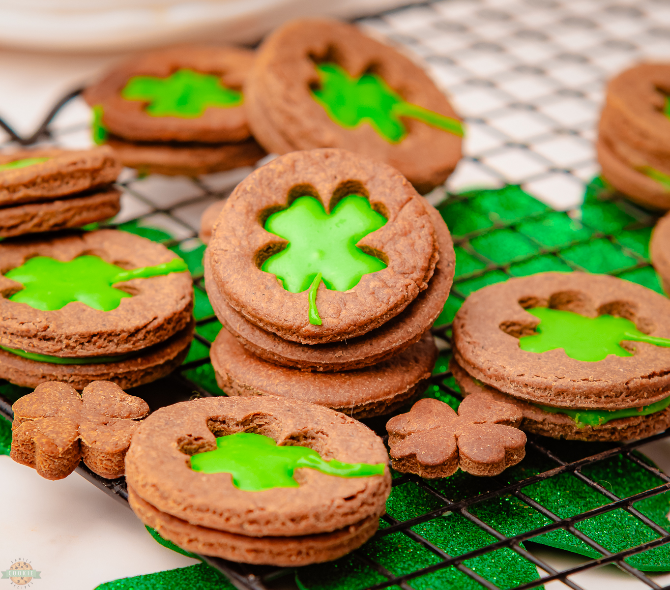 Shamrock Linzer cookies on a cooling rack