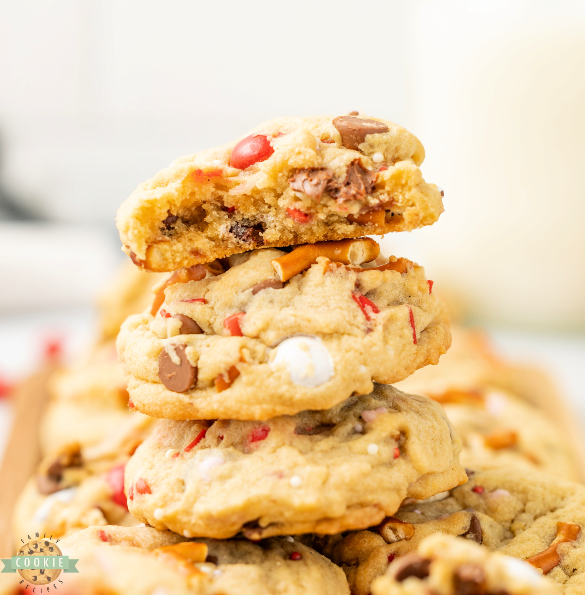 Valentine&rsquo;s Kitchen Sink cookies stacked on a plate for serving.