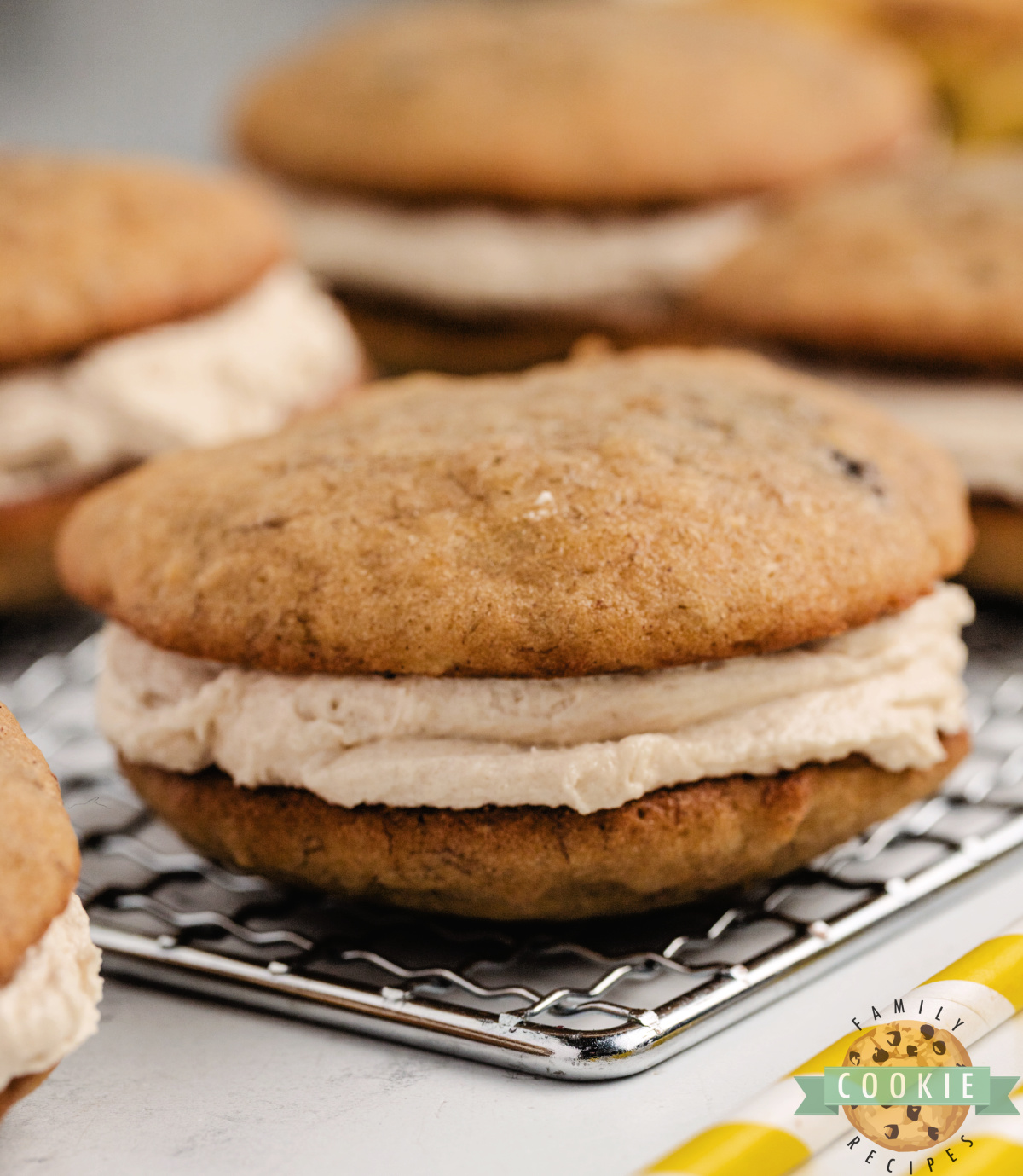 Banana bread sandwich cookies recipe with brown sugar frosting, perfect for using up ripe bananas.