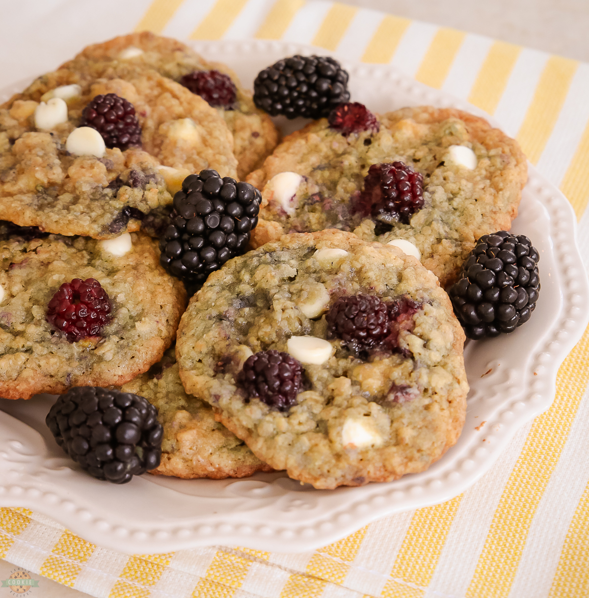 plateful of blackberry cookies with oats in the dough