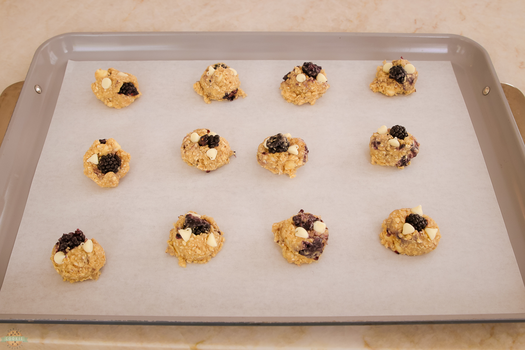 blackberry oatmeal cookies on a baking sheet