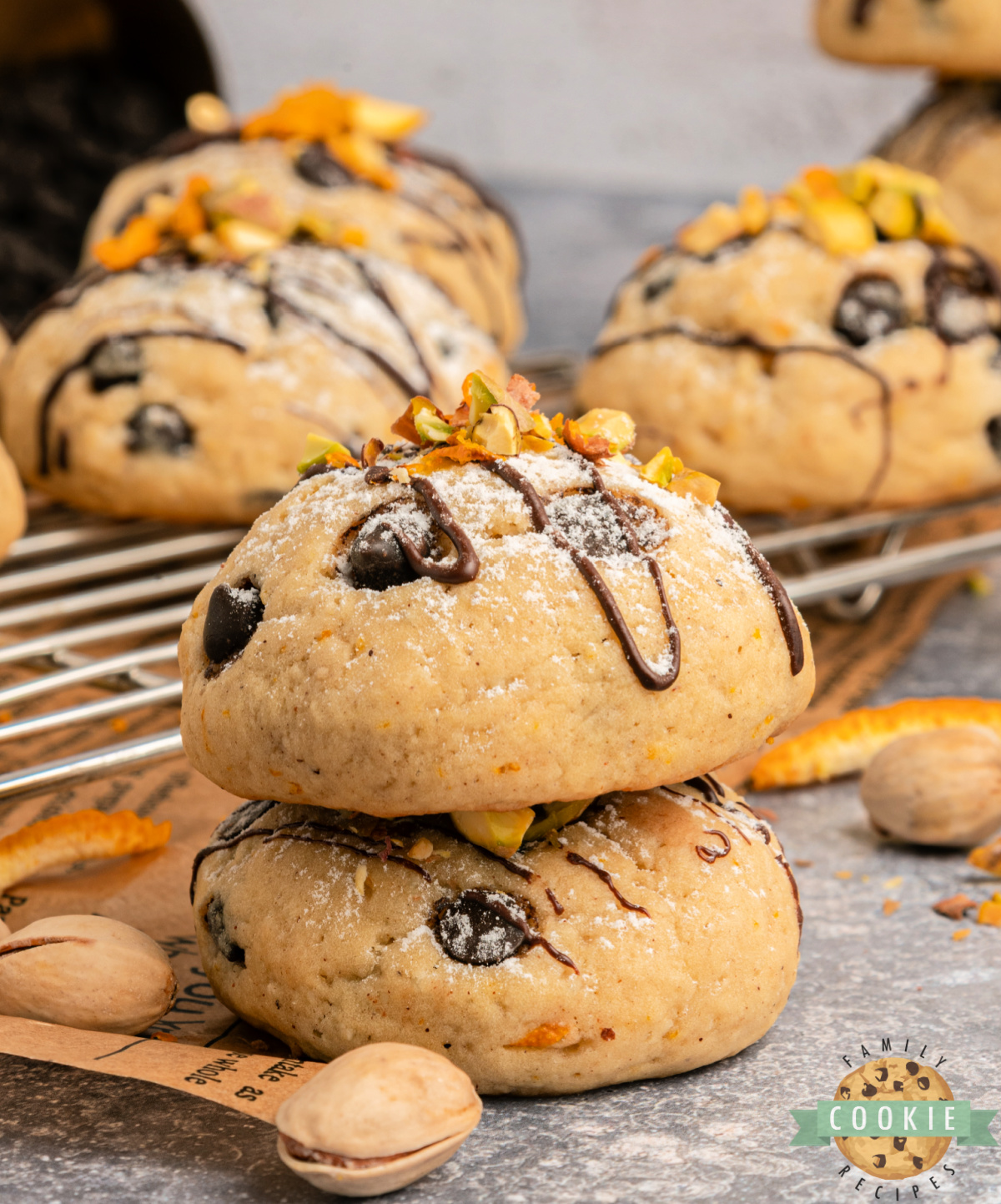 Italian cannoli cookies with powdered sugar and orange zest.