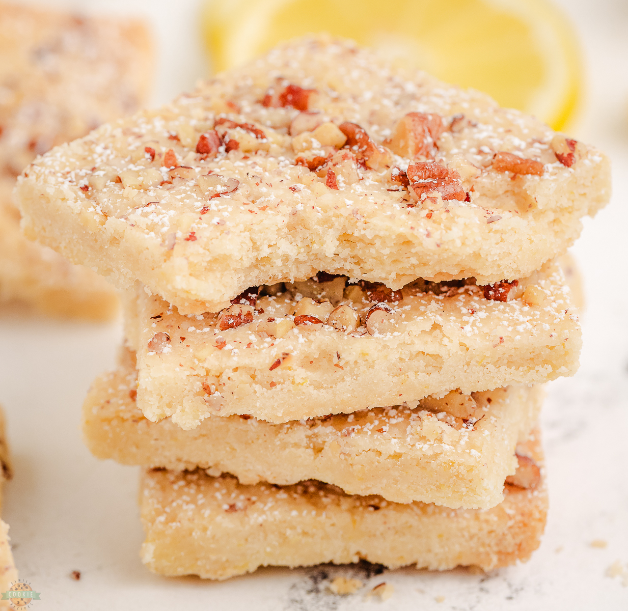 stack of lemon pecan shortbread bars