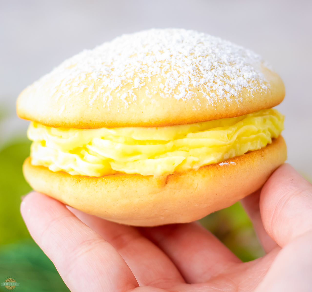 holding a banana cream whoopie pie