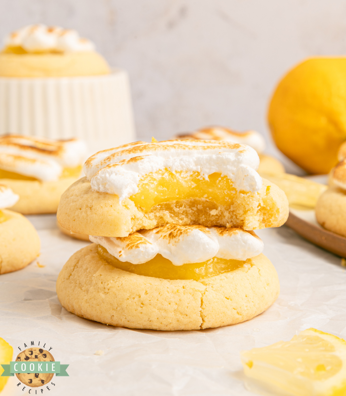 Lemon meringue pie cookie cut in half showing curd filling.