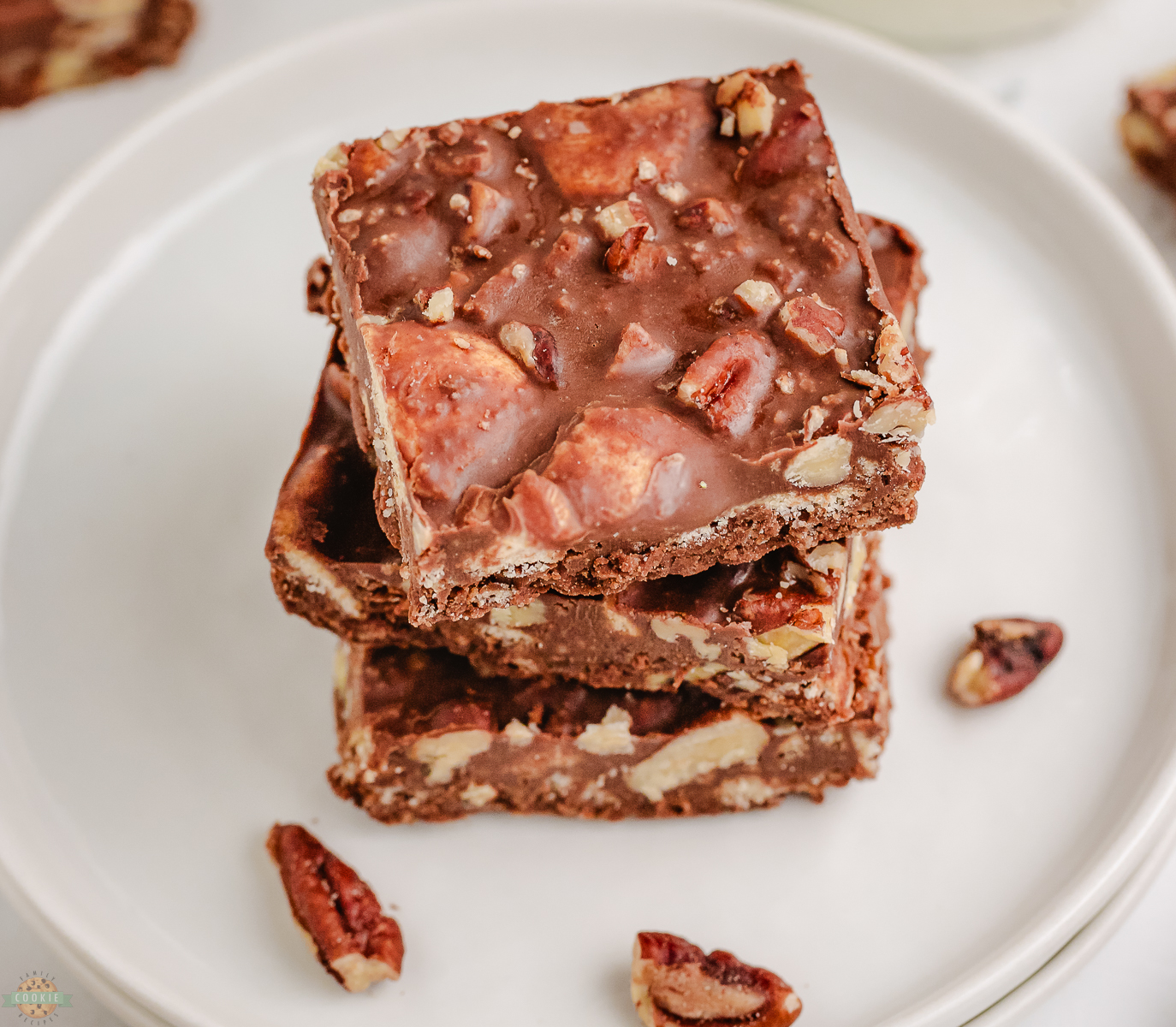 stack of chocolate pecan no bake cookie bars