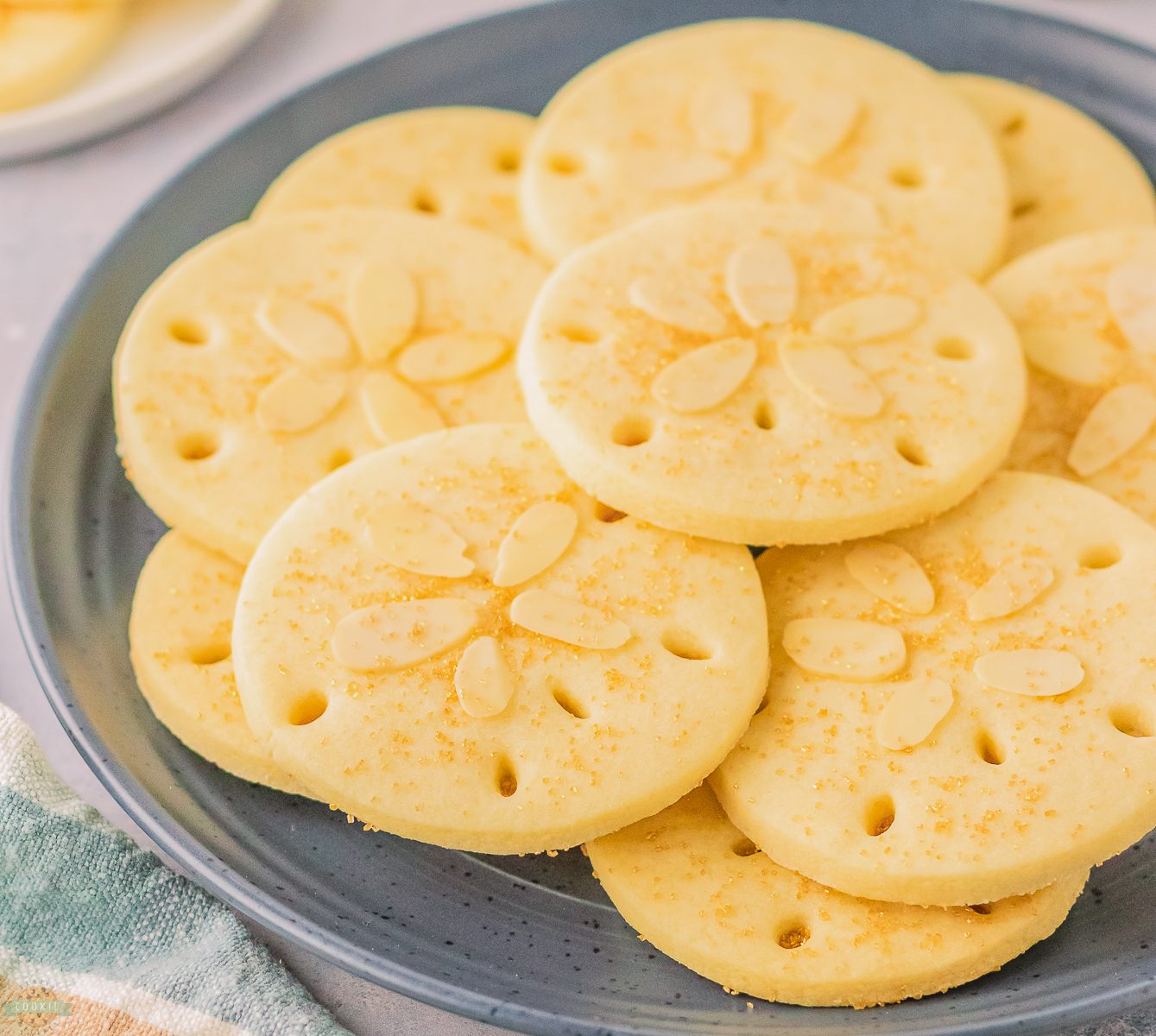 plateful of sand dollar cookies with almonds